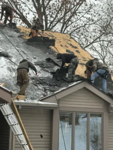 missing asphalt roof shingles after a windstorm